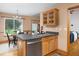 Kitchen with an adjacent dining area featuring stainless steel appliances and abundant light at 404 Denton St, Durham, NC 27713