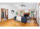 Bright living room with hardwood floors, vaulted ceiling, fireplace, and comfortable seating, creating an inviting space at 404 Denton St, Durham, NC 27713