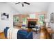 Warm living room with hardwood floors, fireplace, natural light, and comfortable seating creates a relaxing atmosphere at 404 Denton St, Durham, NC 27713