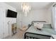This well lit bedroom has neutral colors and calming aesthetic at 404 Porterfield Dr, Youngsville, NC 27596