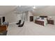 Spacious bedroom featuring a comfortable bed, carpeted floors, and ample natural light, perfect for relaxation and rest at 404 Wanderview Ln, Holly Springs, NC 27540