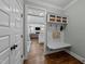 Entryway featuring a built-in bench with storage, leading to the living area at 404 Wanderview Ln, Holly Springs, NC 27540