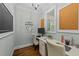 Charming home office featuring hardwood floors and natural light at 404 Wanderview Ln, Holly Springs, NC 27540