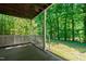 Back porch with a view of nature at 407 Gooseneck Dr # B1, Cary, NC 27513