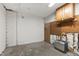 Spacious unfinished basement with exposed wall, and cabinet at 407 Gooseneck Dr # B1, Cary, NC 27513