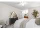 Bright bedroom with calming decor, ceiling fan, and natural light at 407 Gooseneck Dr # B1, Cary, NC 27513