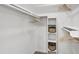 Walk-in closet with built in shelving and baskets at 407 Gooseneck Dr # B1, Cary, NC 27513