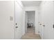 Clean hallway with neutral walls leading to a cozy sitting area at 407 Gooseneck Dr # B1, Cary, NC 27513