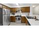 A full view of the kitchen, showcasing modern appliances and plenty of counter space at 407 Gooseneck Dr # B1, Cary, NC 27513