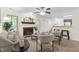 Comfortable living room with a brick fireplace and an open floorplan at 407 Gooseneck Dr # B1, Cary, NC 27513