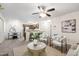 Open-concept living room seamlessly flows into the kitchen and dining area at 407 Gooseneck Dr # B1, Cary, NC 27513