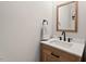 Bathroom featuring a modern vanity, mirror, and stylish fixtures at 411 Buxton St, Durham, NC 27713