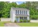 Charming two-story home with a manicured front yard and inviting front porch at 411 Buxton St, Durham, NC 27713