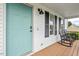 Inviting front porch with rocking chairs and beautiful landscaping at 411 Buxton St, Durham, NC 27713