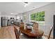 Bright kitchen featuring modern appliances, a garden view, and a sunny breakfast nook. Perfect for cooking and dining at 411 Buxton St, Durham, NC 27713