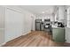 Spacious kitchen features stainless steel appliances and white cabinets, ideal for cooking and meal preparation at 411 Buxton St, Durham, NC 27713