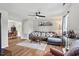 Comfortable living room with a ceiling fan and plenty of natural light at 411 Buxton St, Durham, NC 27713