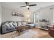 Cozy living room featuring wood floors, large windows, and modern furnishings at 411 Buxton St, Durham, NC 27713