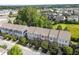 Aerial view of townhomes with lush greenery surrounding the neighborhood at 4124 Sykes St, Cary, NC 27519