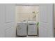 Laundry room with a washer and dryer inside of a closet at 4124 Sykes St, Cary, NC 27519
