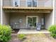 Back patio with two chairs and table at 4124 Sykes St, Cary, NC 27519