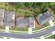 Aerial view of a neighborhood showcasing well-maintained homes, yards, and streetscapes at 428 Crayton Oak Dr, Cary, NC 27519