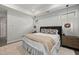 Inviting bedroom with stylish furnishings, plush rug, and tray ceiling at 428 Crayton Oak Dr, Cary, NC 27519