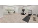 Bonus room with exercise equipment, comfortable seating area and bright natural light at 428 Crayton Oak Dr, Cary, NC 27519