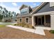 Inviting home exterior featuring stone accents, a covered porch, and manicured landscaping at 428 Crayton Oak Dr, Cary, NC 27519