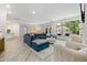Spacious living room with a large sectional sofa and open floor plan at 428 Crayton Oak Dr, Cary, NC 27519