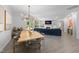 Open concept design showcasing dining area and living room with fireplace and outdoor views at 428 Crayton Oak Dr, Cary, NC 27519