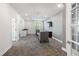 Well-lit community lounge with comfortable seating, modern decor, and a convenient wet bar area at 428 Crayton Oak Dr, Cary, NC 27519