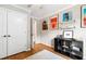 Bedroom with hardwood floors, neutral walls, modern art and natural light at 433 Rosehaven Dr, Raleigh, NC 27609