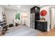 Bonus room features a wet bar, stainless steel refrigerator and space for recreation at 433 Rosehaven Dr, Raleigh, NC 27609