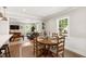 Bright dining area with views of the living room and backyard at 433 Rosehaven Dr, Raleigh, NC 27609