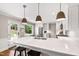 Beautiful kitchen featuring a large island, quartz countertops, and stainless steel appliances at 433 Rosehaven Dr, Raleigh, NC 27609