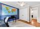 Office with hardwood floors, grey walls, closet and natural light at 433 Rosehaven Dr, Raleigh, NC 27609