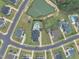 Aerial view of community with pond and pool, set amongst well-maintained lawns at 450 S Parliament Way, Clayton, NC 27520