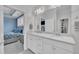 Bathroom featuring double sinks, white cabinets, and plenty of counter space at 450 S Parliament Way, Clayton, NC 27520
