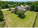 Spacious backyard featuring a large grassy area, perfect for outdoor activities and entertaining at 4621 Basilica Dr, Holly Springs, NC 27540
