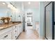 Bright bathroom with double vanity, shower, and a bathtub at 4621 Basilica Dr, Holly Springs, NC 27540