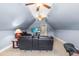 Large bonus room with vaulted ceiling and plush carpeting offers flexible living space at 4621 Basilica Dr, Holly Springs, NC 27540