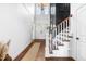 Elegant foyer with high ceilings, chandelier, hardwood floors, and staircase at 4621 Basilica Dr, Holly Springs, NC 27540