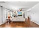 Bright and airy living room featuring hardwood floors and a cozy fireplace at 4621 Basilica Dr, Holly Springs, NC 27540