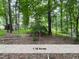 Beautiful 1.16 acre lot with mature trees at 4720 Rivermont Rd, Durham, NC 27712