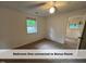 Bedroom one offers natural light, fresh carpet, and convenient access to a bonus room at 4720 Rivermont Rd, Durham, NC 27712