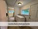 Laundry/mudroom combo with a window and storage provides convenience and organization at 4720 Rivermont Rd, Durham, NC 27712