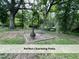 Charming backyard patio is the perfect spot to entertain or relax at 4720 Rivermont Rd, Durham, NC 27712