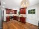 Bright kitchen with stainless steel appliances and granite countertops at 4909 Brookhaven Dr, Raleigh, NC 27612