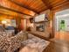 Inviting living room featuring a cozy fireplace, wood floors, and stylish decor at 4909 Brookhaven Dr, Raleigh, NC 27612